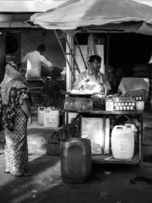 Street food vendor serving customers