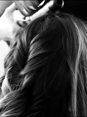 Hair stylist working in a salon